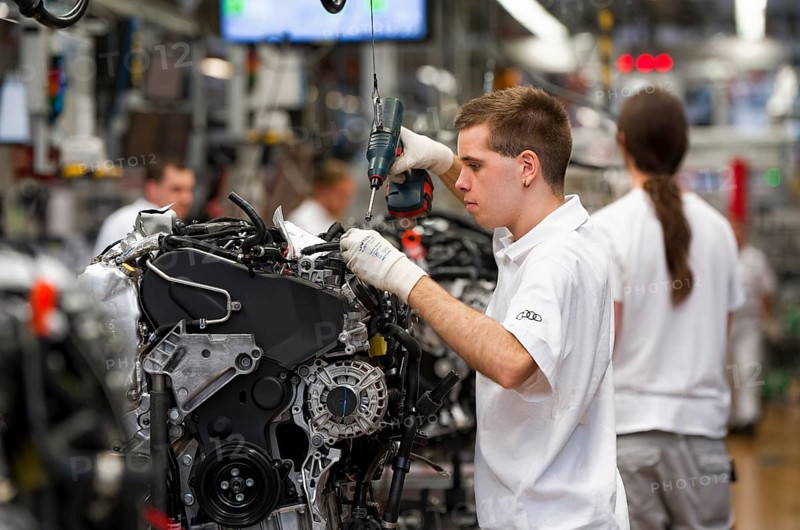 Man working on the production line of the Audi A3 at the Audi plant