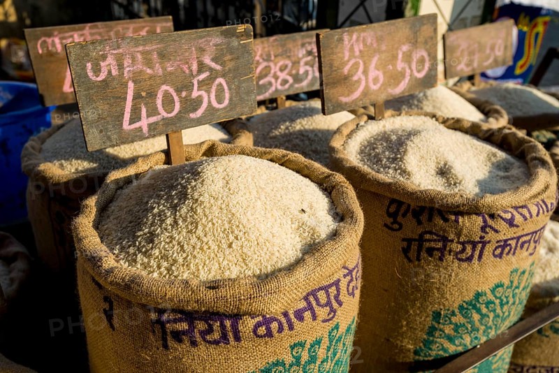 Rice in different qualities for sale in bags at an open air market