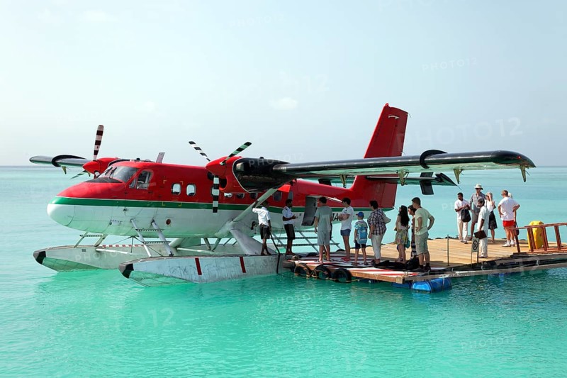 Passengers boarding a De Havilland Canada DHC-6 Twin Otter hydroplane