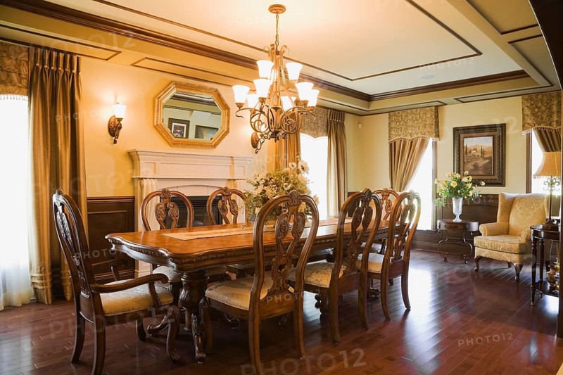 Luxurious dining room with a wooden table and chairs