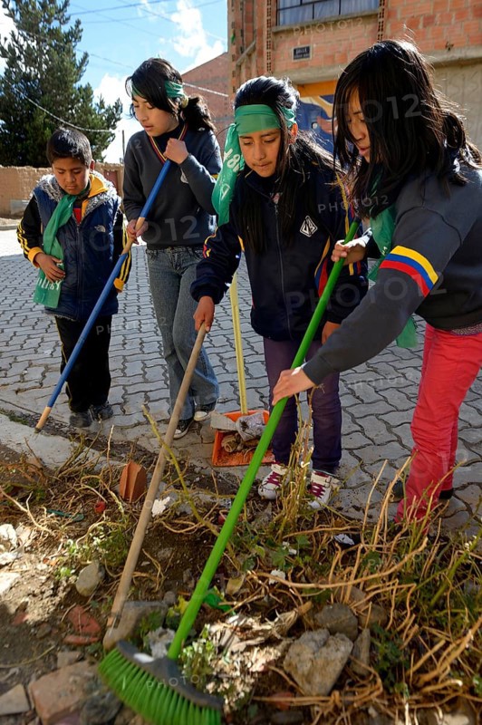 Children and young people cleaning the town on a day of action to protect the environment