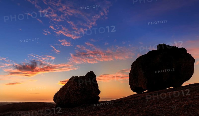 Silhouettes of two big rocks near Hyden