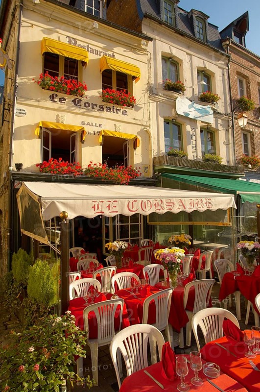 Le Corsaire restaurant with terrace tables set ready for lunch