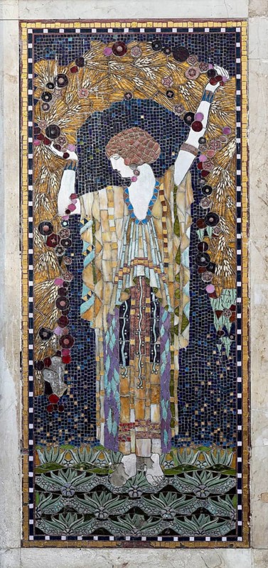 Woman holding a garland of corn