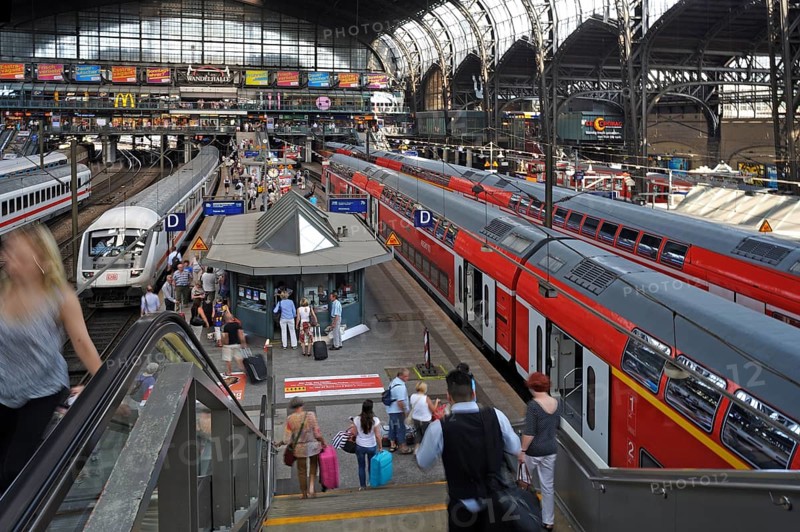 Station concourse with travelers