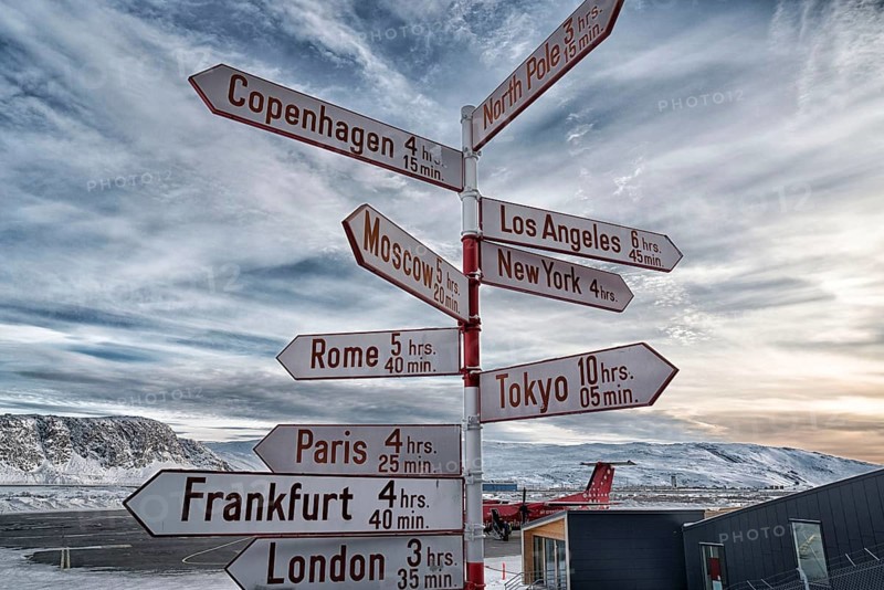 Guide with distances of international cities at the airport of Kangerlussuaq