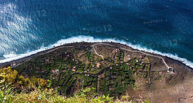 Terraces on the cliff coast of Santa Maria Madalena at the foot of Cabo Girao