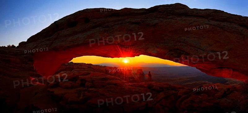 Sunrise at Mesa Arch stone arch