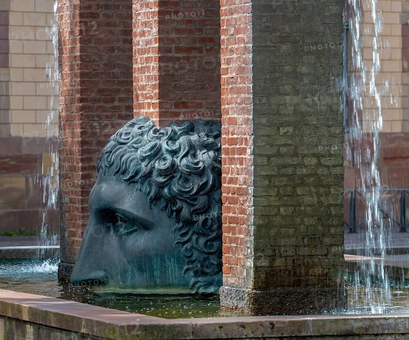 Fountain with double-faced Janus head