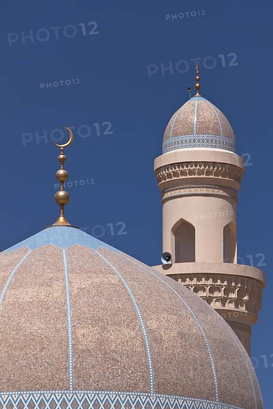 Mosque with a golden crescent moon and a minaret