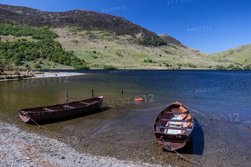 Boats on the shore of the lake of Crummock Water