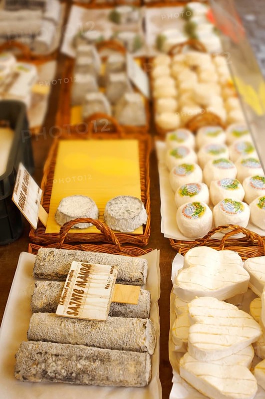Goat soft cheese on a market stall