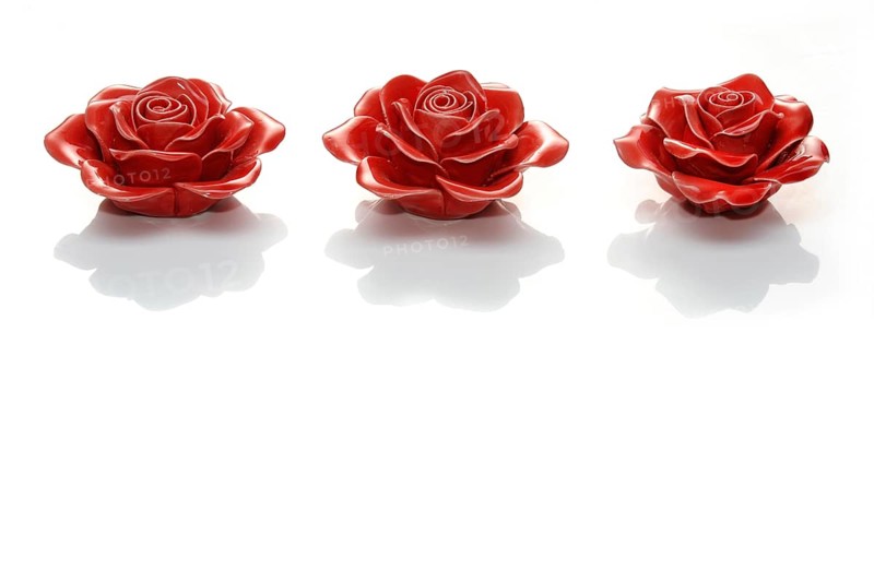 Three rose flowers made of ceramics