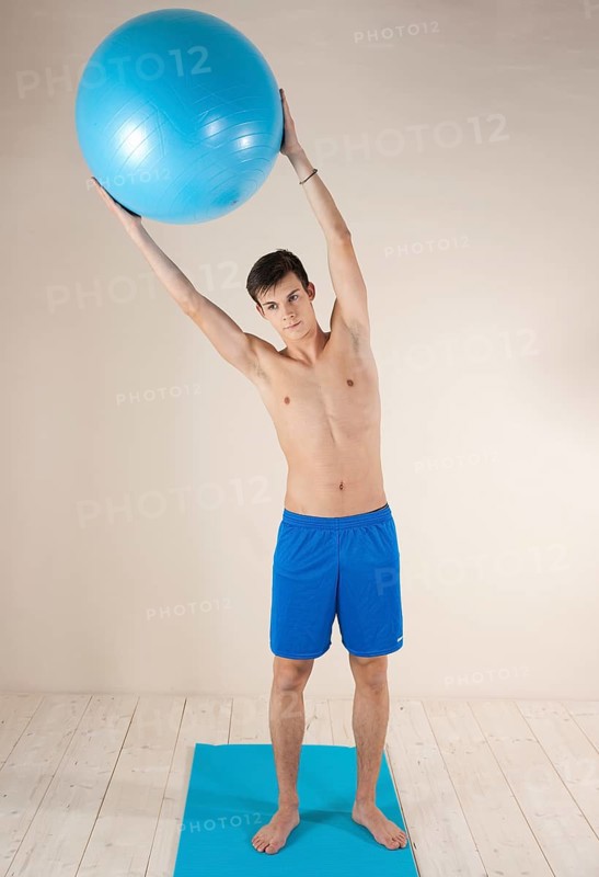 Young man doing stabilization exercises