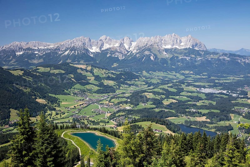 View from the Hahnenkamm summit onto impounding reservoir and Lake Schwarzsee