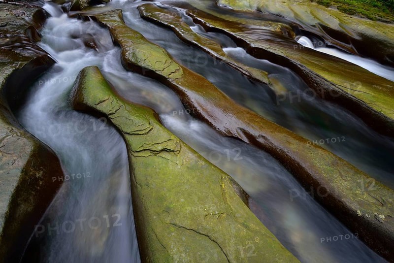 Rock gullies formed by water in the riverbed