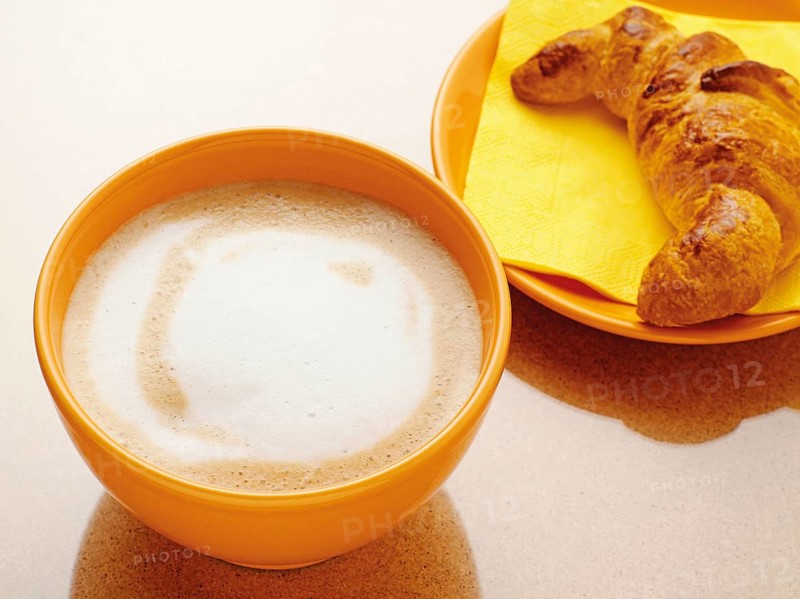 Latte with a croissant