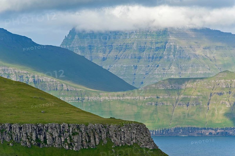 Clouds over the islands of Kalsoy and Kunoy