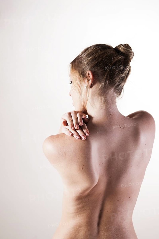 Bare back of a young woman