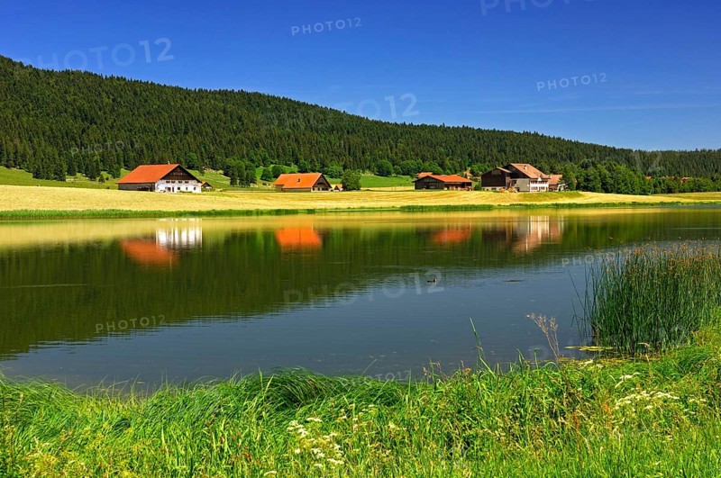 Farmhouses in the Les Tallieres settlement at the Lac des Tailleres