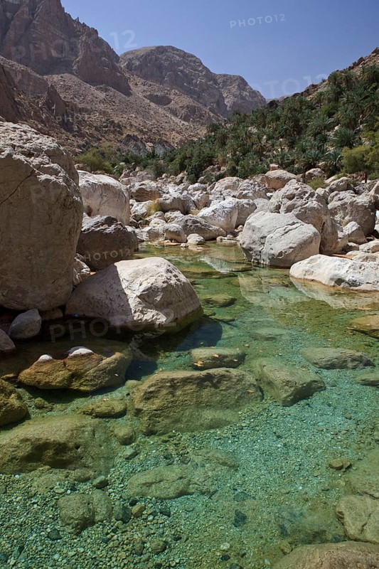 Clear water in the Wadi Shab mountain ravine