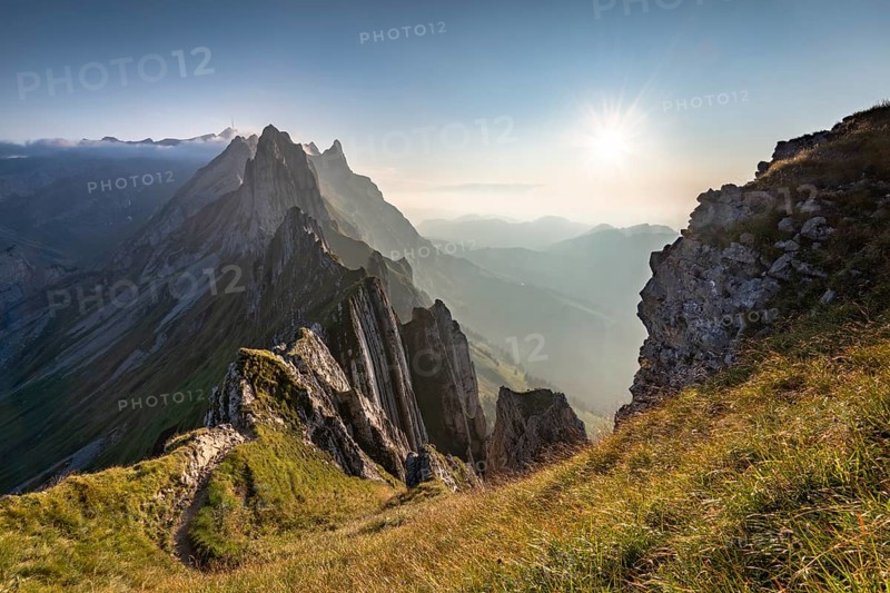 Mountain ridge in the Alpstein range in atmospheric light