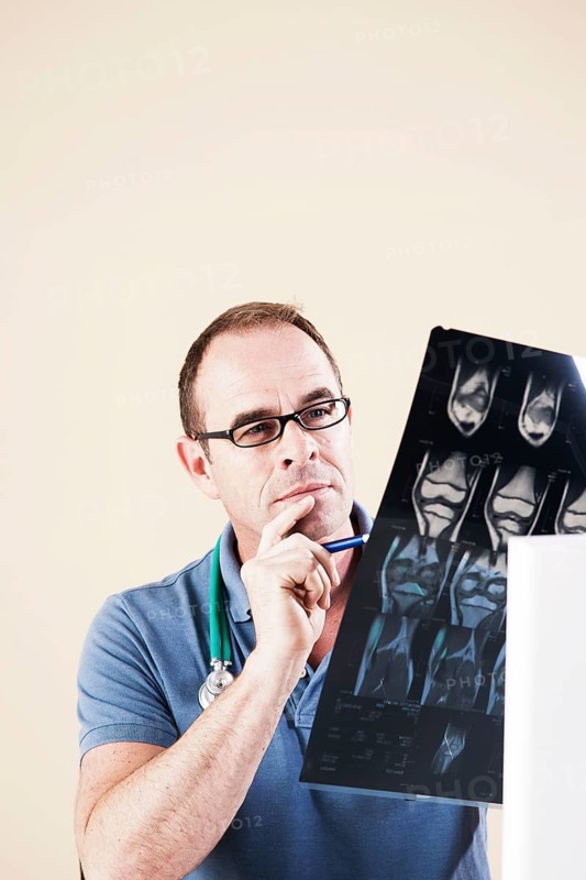 Doctor looking at an X-ray