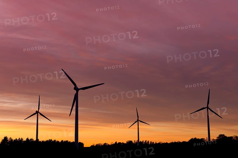 Wind turbines at sunset