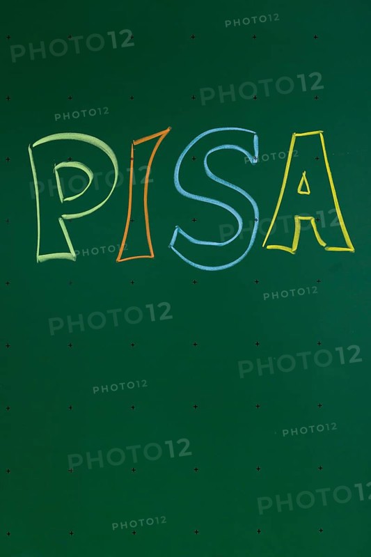 PISA' written with chalk on a blackboard