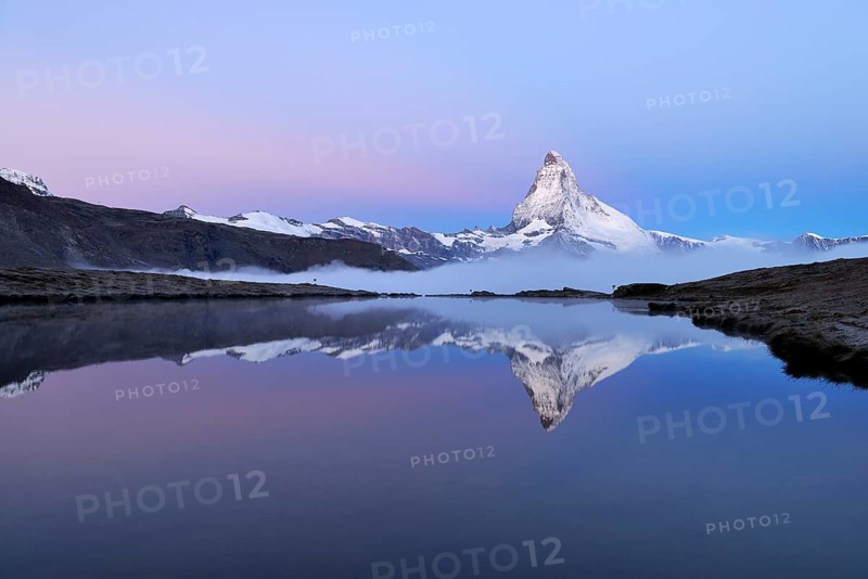 Matterhorn reflected in Lake Stellisee at dusk