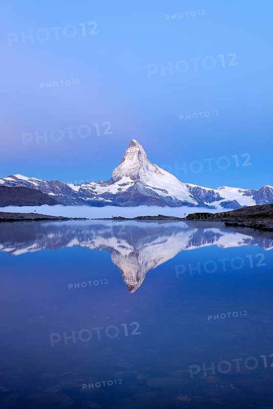 Mt Matterhorn reflected in Stellisee Lake at dusk
