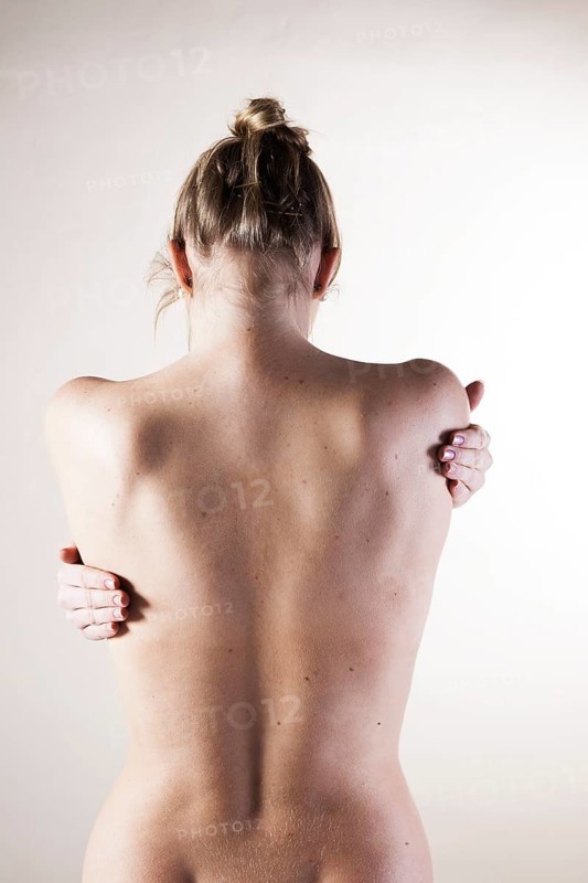 Bare back of a young woman