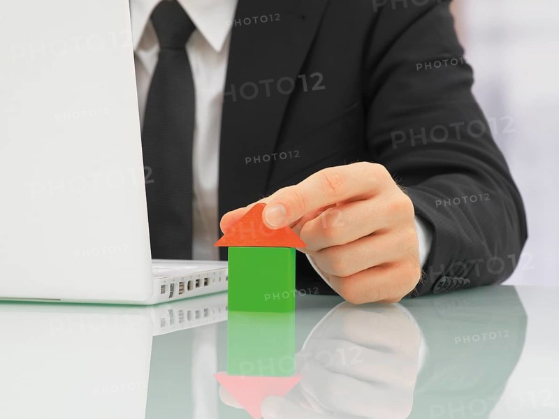 Businessman in an office with a laptop