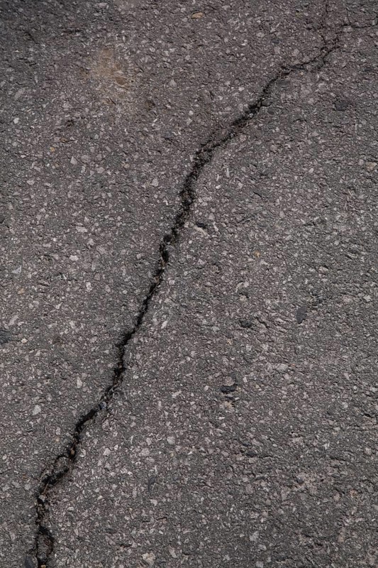 Cracked asphalt pavement