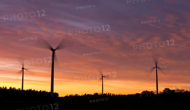 Wind turbines at sunset