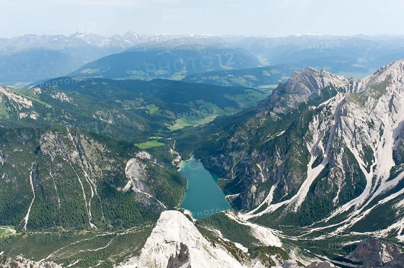 Panoramic view of the Alps from the peak of Mt Seekofel towards the north with Pragser Wildsee Lake