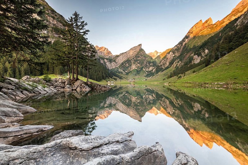 Mountains reflected at sunrise in Lake Seealpsee