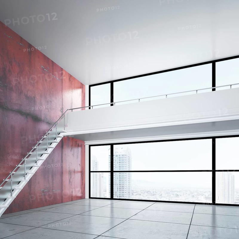 Empty room with a gallery level
