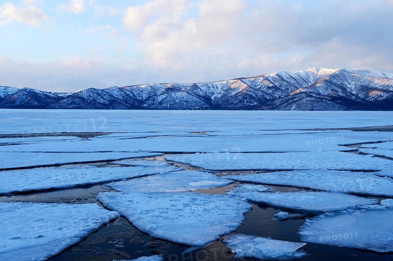 Frozen Lake Kussharo with ice floes in the front