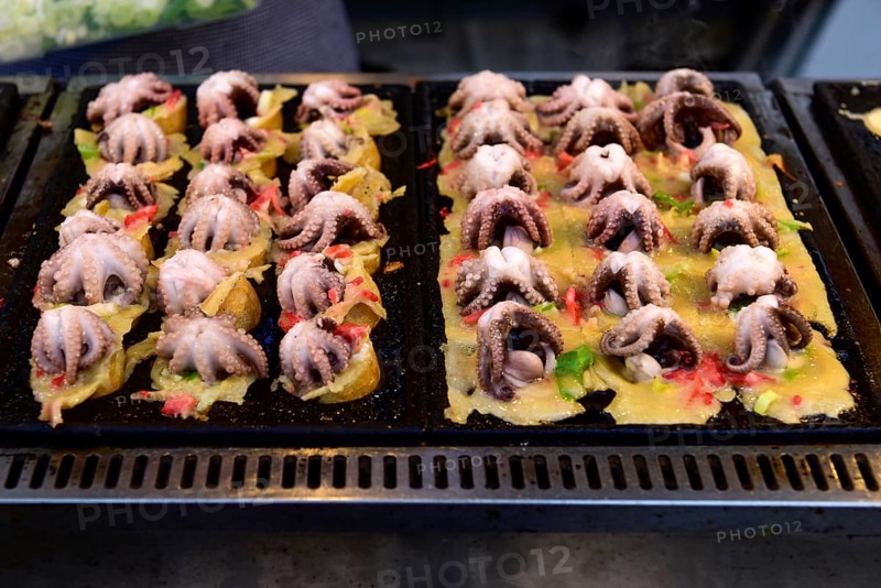 Baby octopus on grill at a food stall