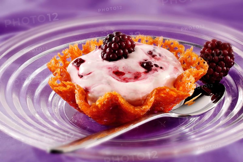 Blackberry mousse in a brandy snap basket