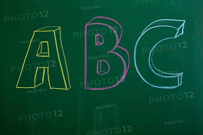 ABC' written with chalk on a blackboard