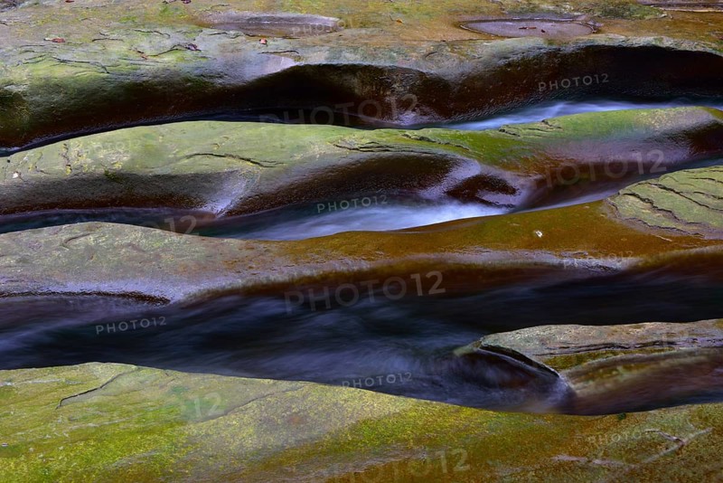 Rock gullies formed by water in the riverbed