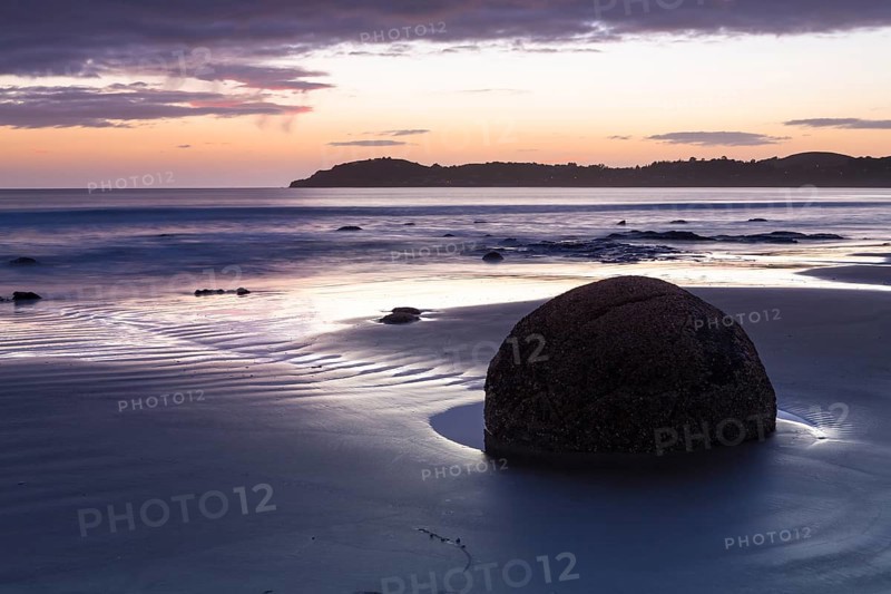 Moeraki Boulders on the beach at sunrise