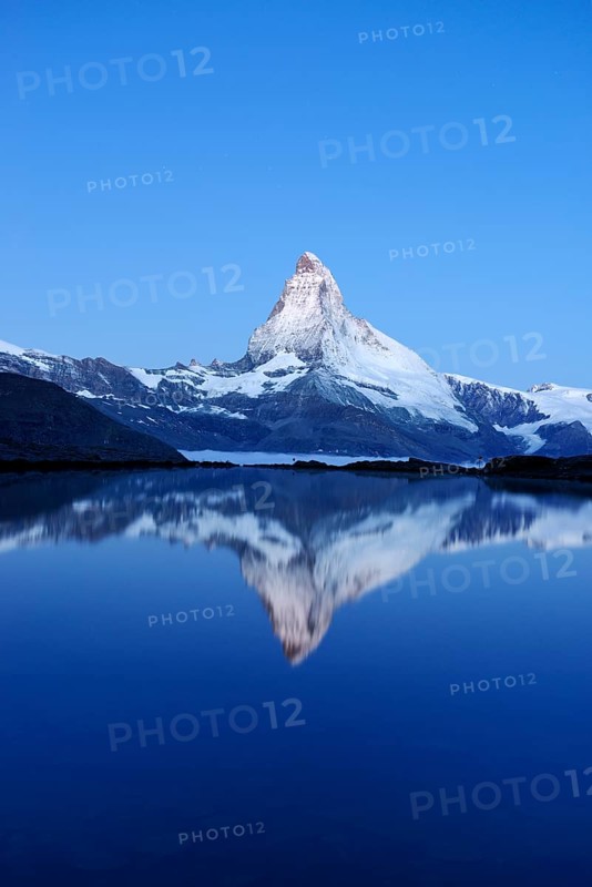 Mt Matterhorn reflected in Stellisee Lake at dusk