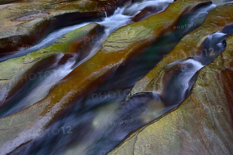 Rock gullies formed by water in the riverbed