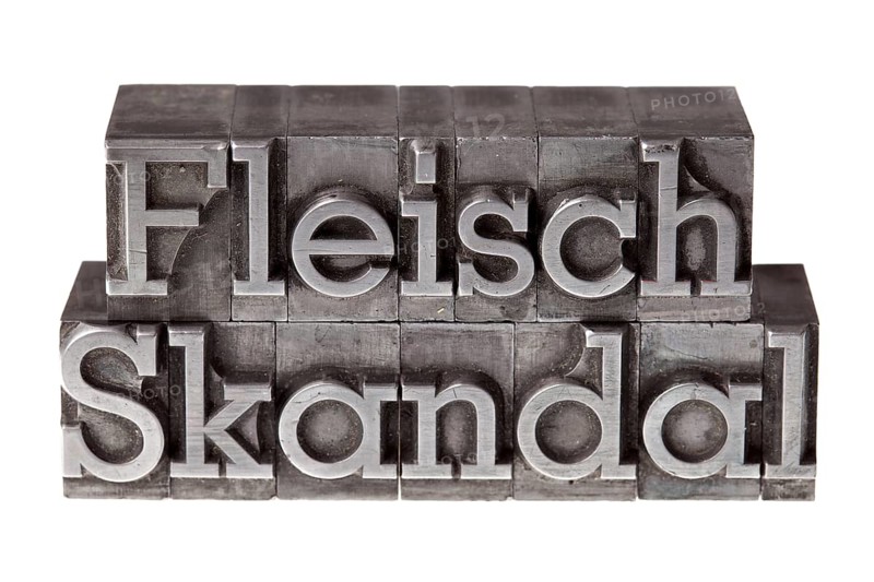 Old lead letters forming the term 'Fleischskandal'