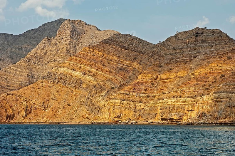 Folded rocks as a result of geological processes