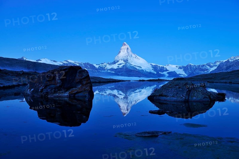 Mt Matterhorn reflected in Stellisee Lake at dusk