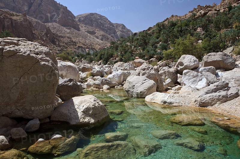 Clear water in the Wadi Shab mountain ravine